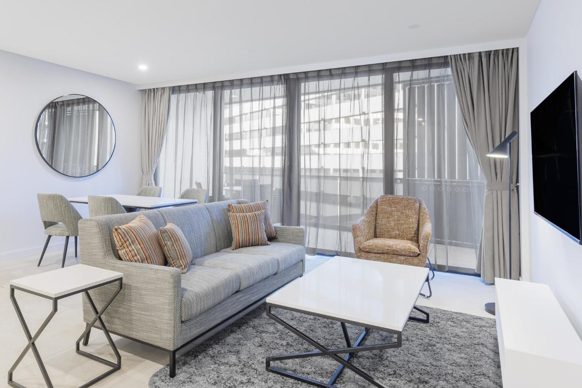 Meriton Suites Canberra Extérieur photo The interior of a typical apartment