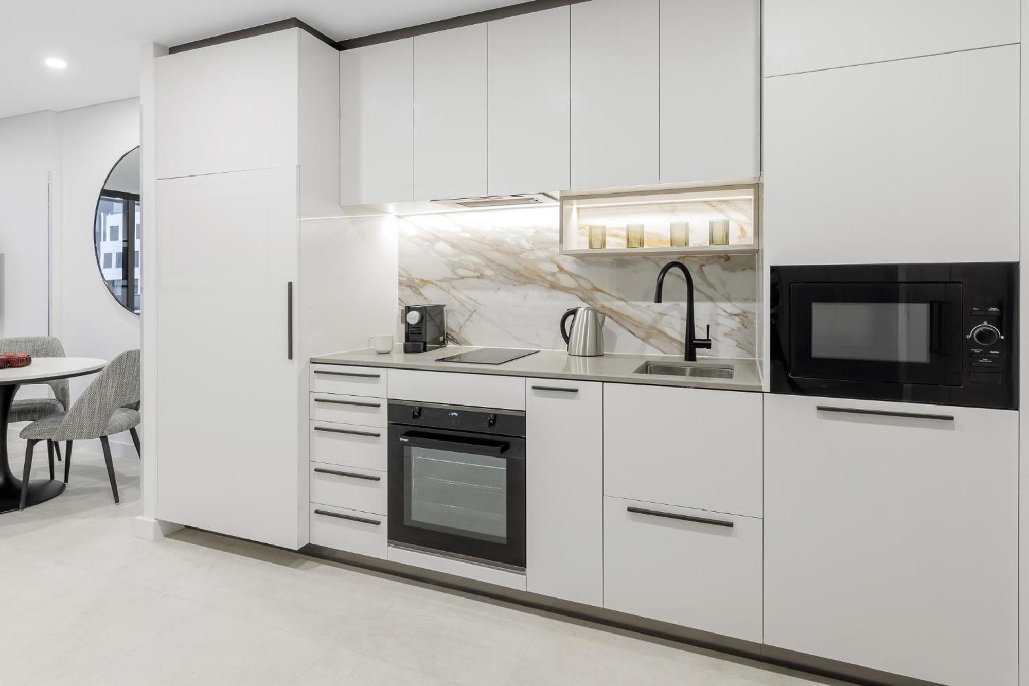 Meriton Suites Canberra Extérieur photo A modern kitchen