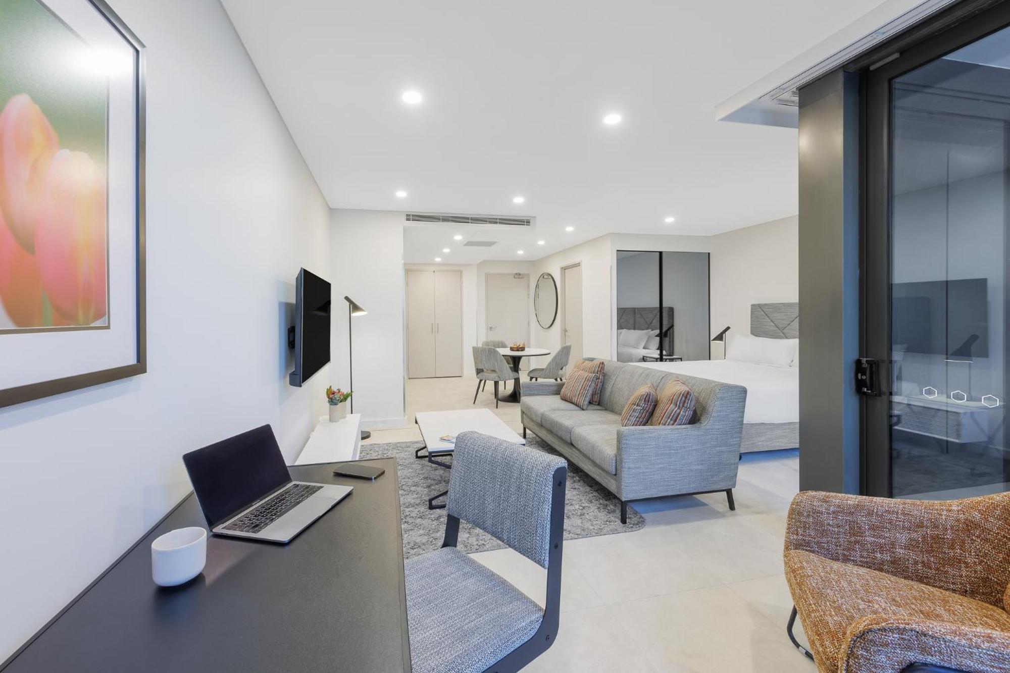 Meriton Suites Canberra Extérieur photo A typical apartment interior