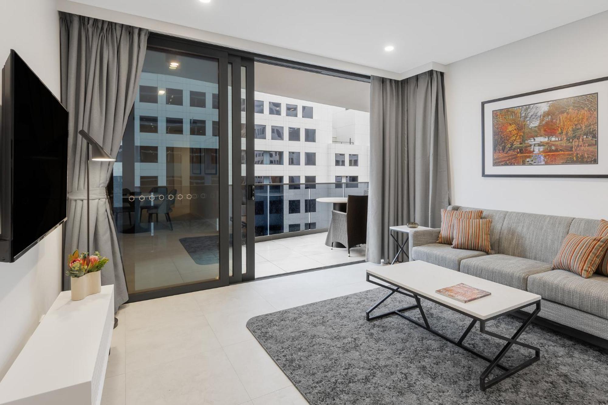 Meriton Suites Canberra Extérieur photo Living room
