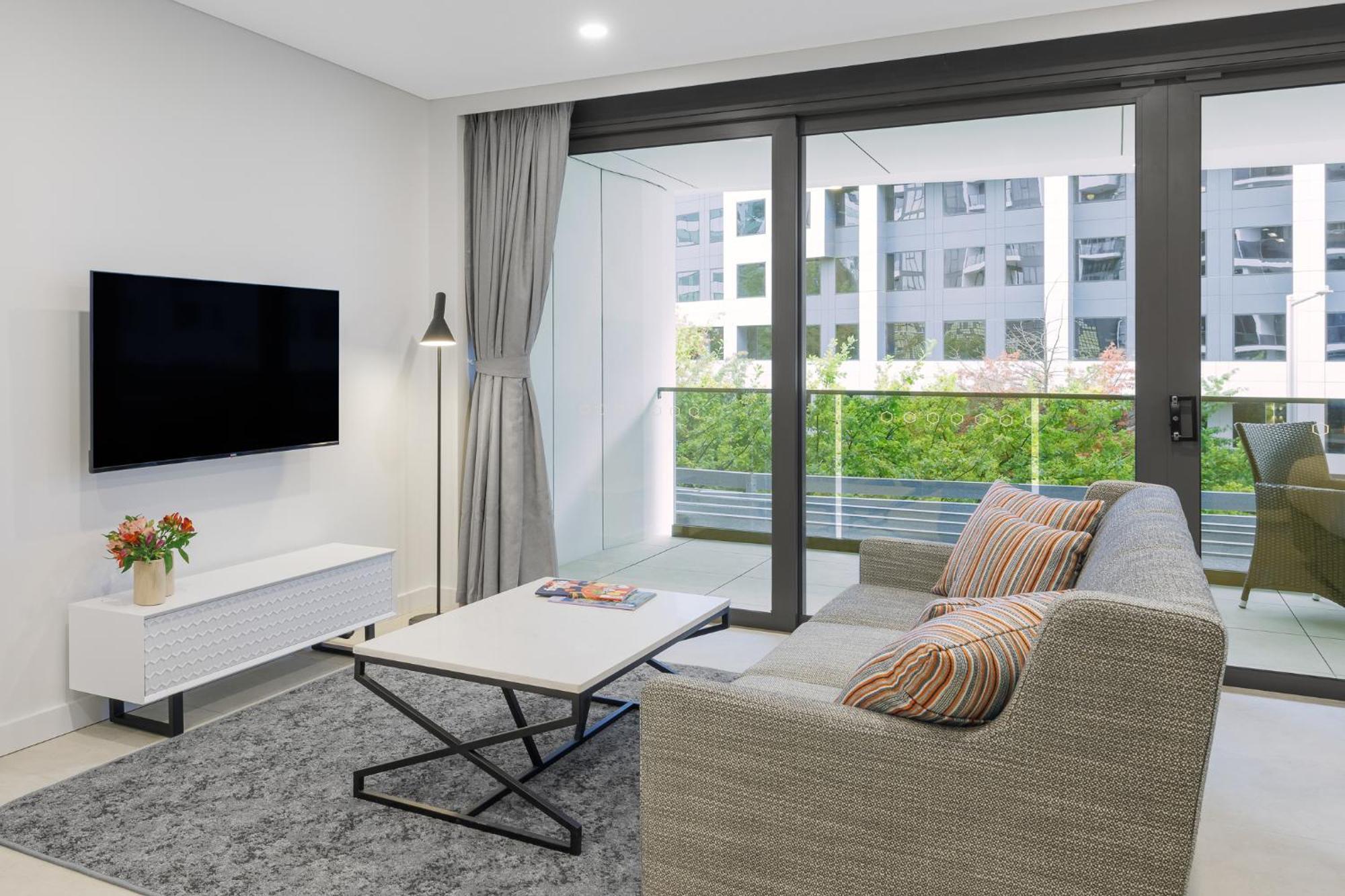 Meriton Suites Canberra Extérieur photo Living room
